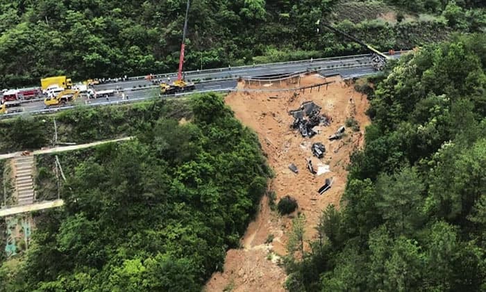 death-toll-jumps-to-at-least-48-in-southern-china-highway-collapse-as-search-continues