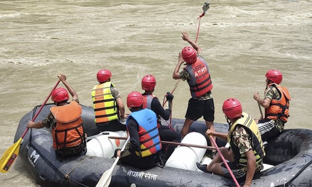 Rescuers in Nepal recover 7 bodies after a landslide swept 2 buses of people into a river - https://cdn.connectfm.ca/Rescuers-Nepal.jpg