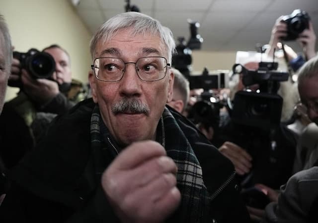 A Russian court sentences the co-chair of a Nobel-winning rights group to 30 months in prison - https://cdn.connectfm.ca/arrest.jpg